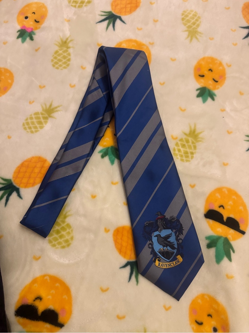 Blue Striped Necktie with Crest Detail